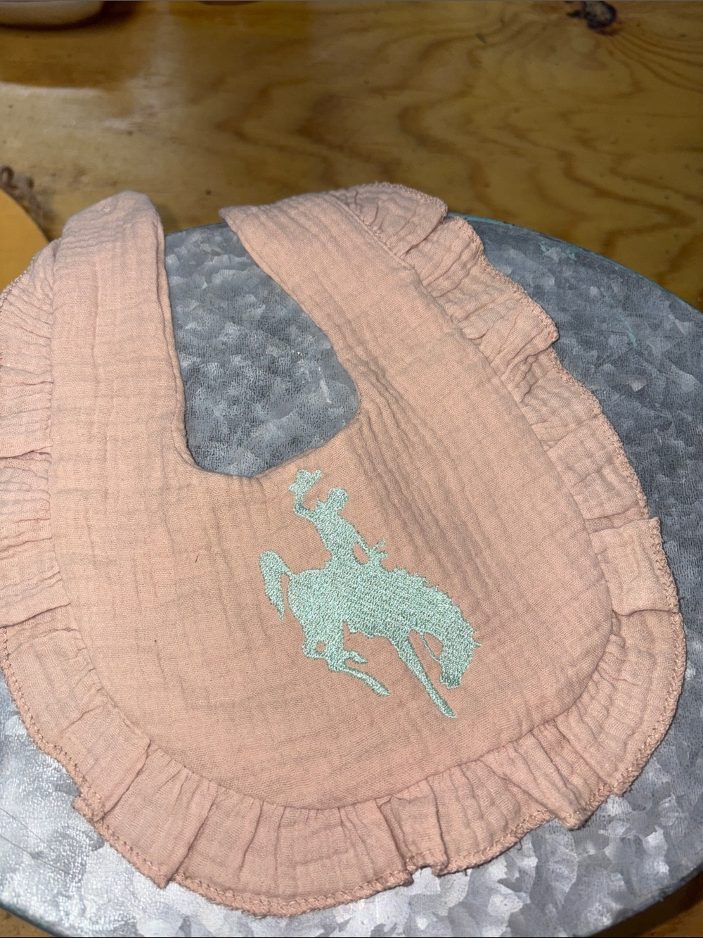 Peach Ruffled Baby Bib with Rodeo Embroidered Design